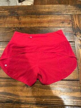 Lululemon shorts Size:8 Inseam:4”. Red